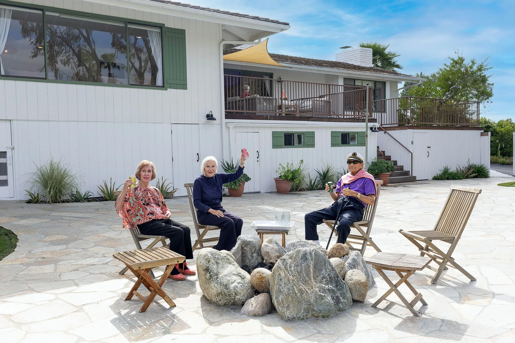 Residents gathered at the fire pit at Casa La Granada